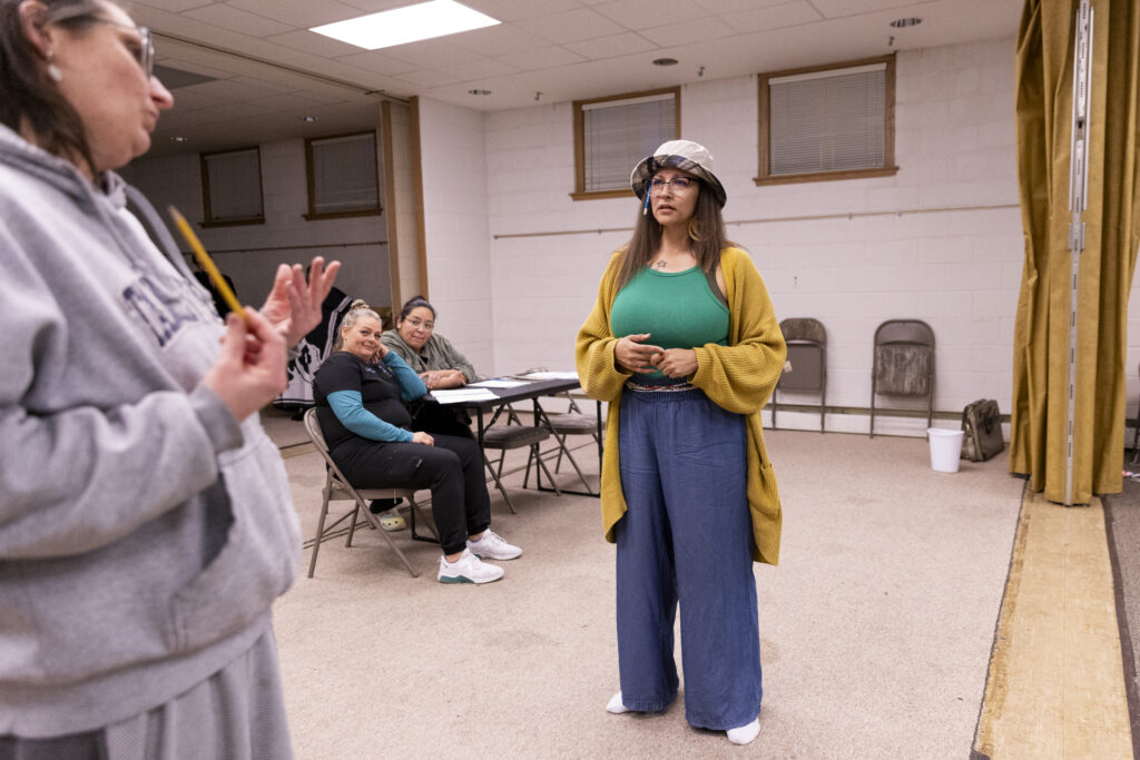 Nature Medicine Song Villegas (far right) rehearses a scene with castmates (from left) Joy Marshall, Christy Farlee and Carina DuMarce, for “By a Thread,” a play put on by the Anastasis Theatre, at St. Paul United Methodist Church in Omaha on Tuesday, March 18, 2025.<br />(Anna Reed / Flatwater Free Press)