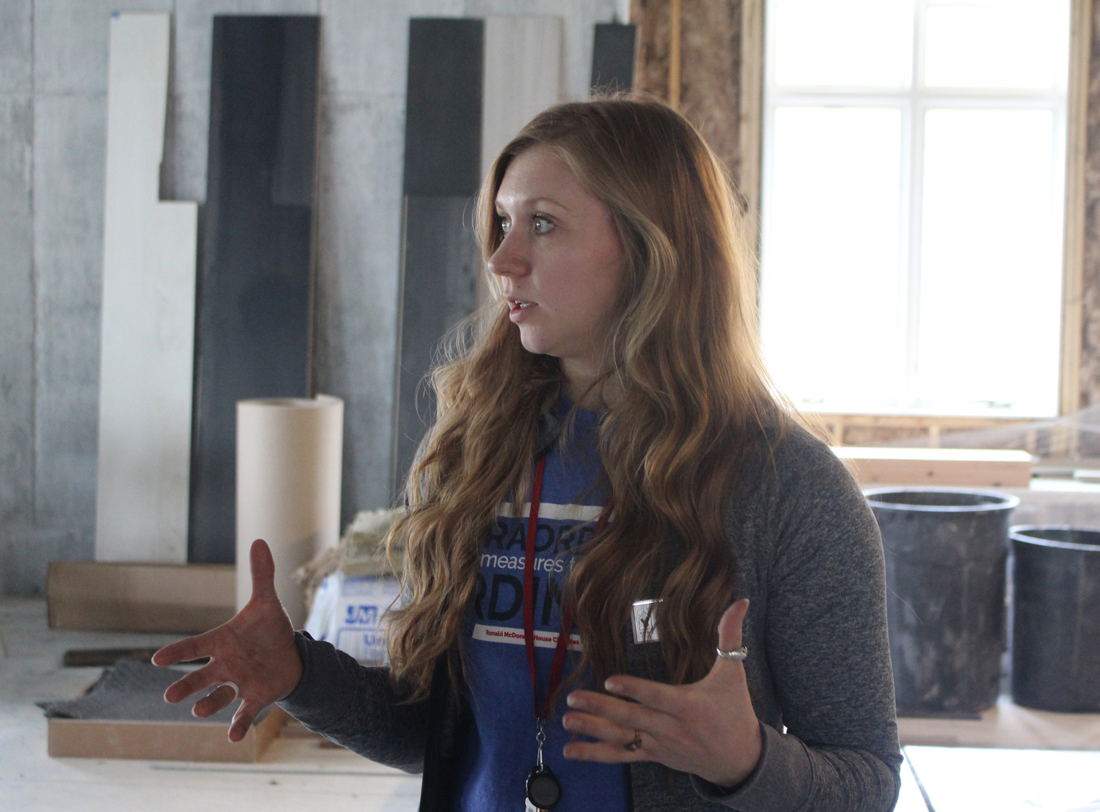 Alex Benson, community philanthropy coordinator, gives a tour of the recently renovated and expanded Ronald McDonald House, 620 S. 38th Ave., during an open house Saturday, May 11, 2019. (Photo by Scott Stewart)