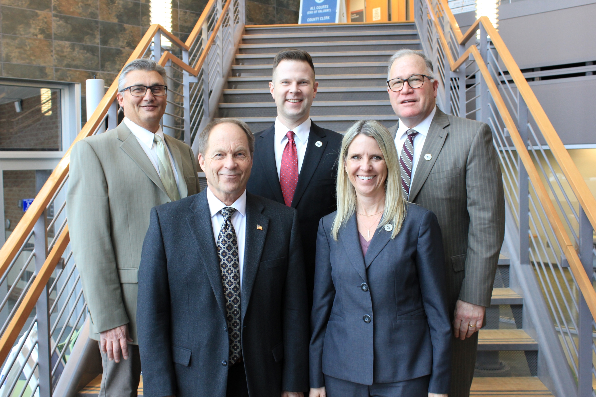 Sarpy County Commissioners. From Left to Right: Gary Mixan (#4), Jim Warren (#5), David Klug (#2), Angela (Angi) Burmeister (#3), Don Kelly (#1).
