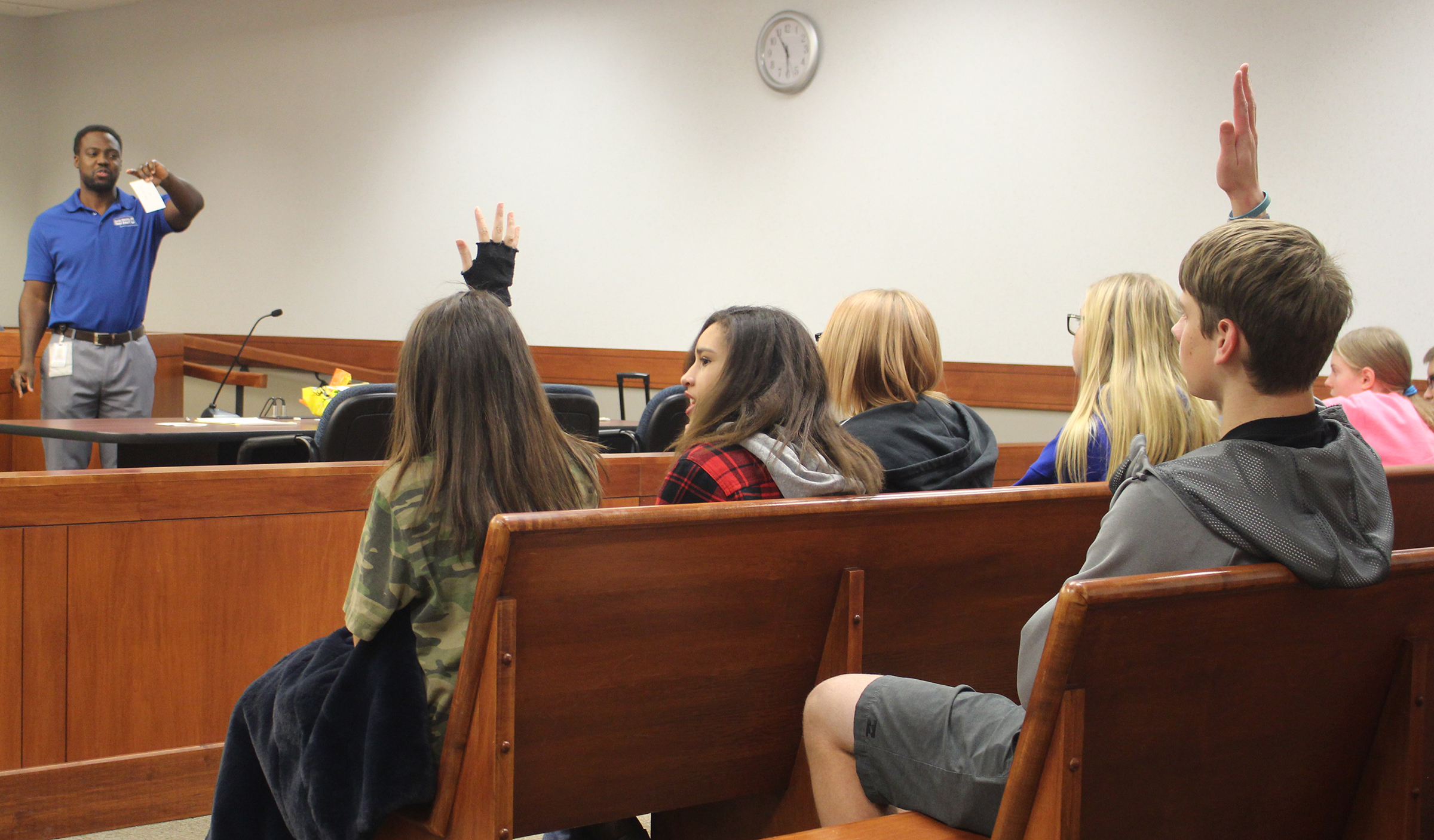 Sarpy County Diversion Officer Leonard Matthias, who coordinates the Sarpy County Teen Court program, quizzes teens during a group activity at the Sarpy County Courthouse in Papillion on Thursday, Nov. 7, 2019. (Scott Stewart/Daily Record)