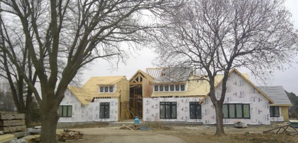 Construction liens of nearly $1 million have been filed against this 4,800-square-foot east Lincoln home, at 11700 Van Dorn St., that was being built by deceased businessman Aaron Marshbanks. This picture was taken a year ago. The acreage includes a barndominium with an indoor basketball court, a swimming pool and a guest cottage. (Courtesy of the Lancaster County Assessors Office)