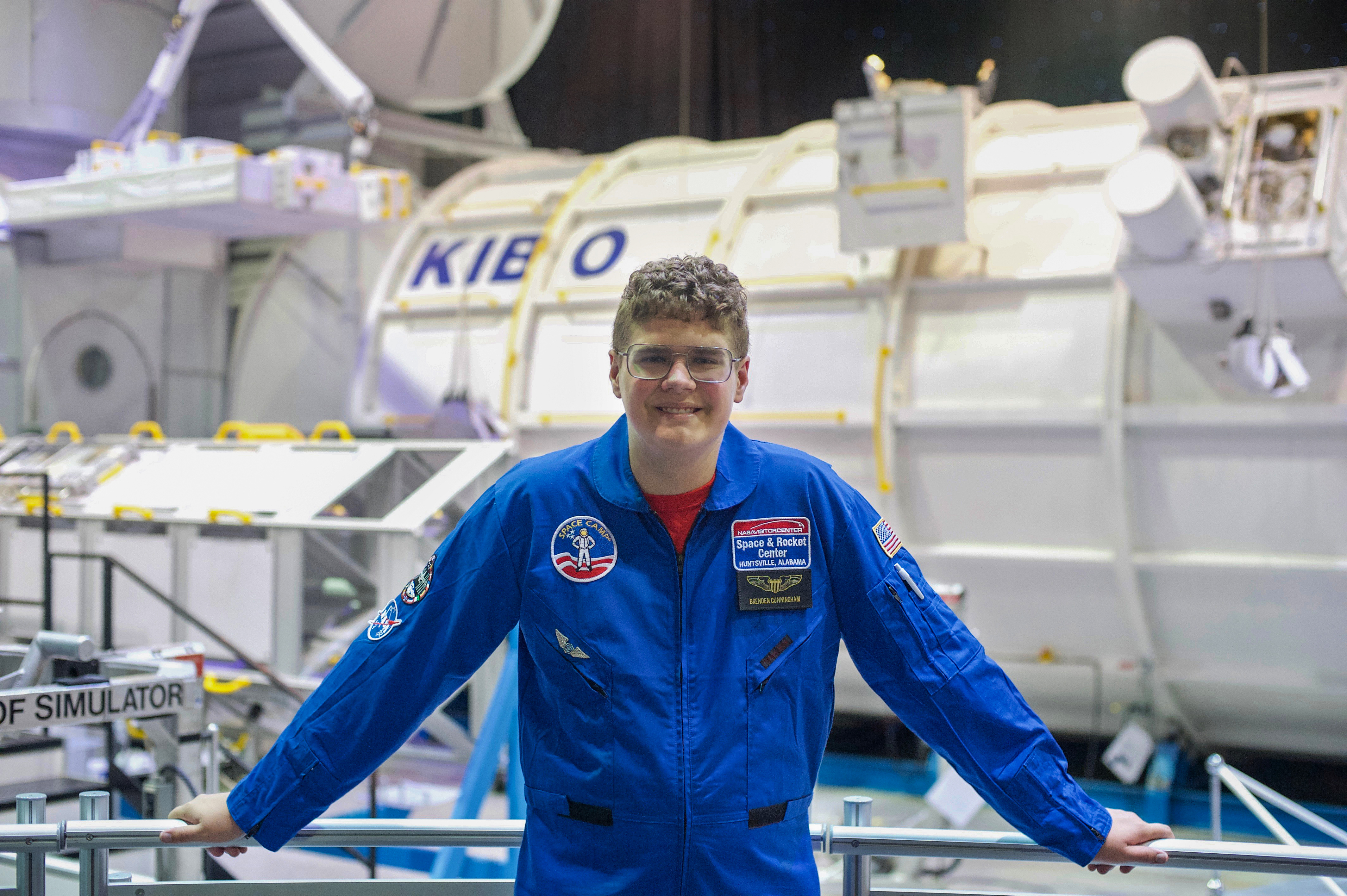 Ralston High School freshman Brenden Cunningham attended space camps in Huntsville, Alabama, and Hutchinson, Kansas, this summer.  He is shown above at the Huntsville camp.				                   (Amy Cunningham via RPS)