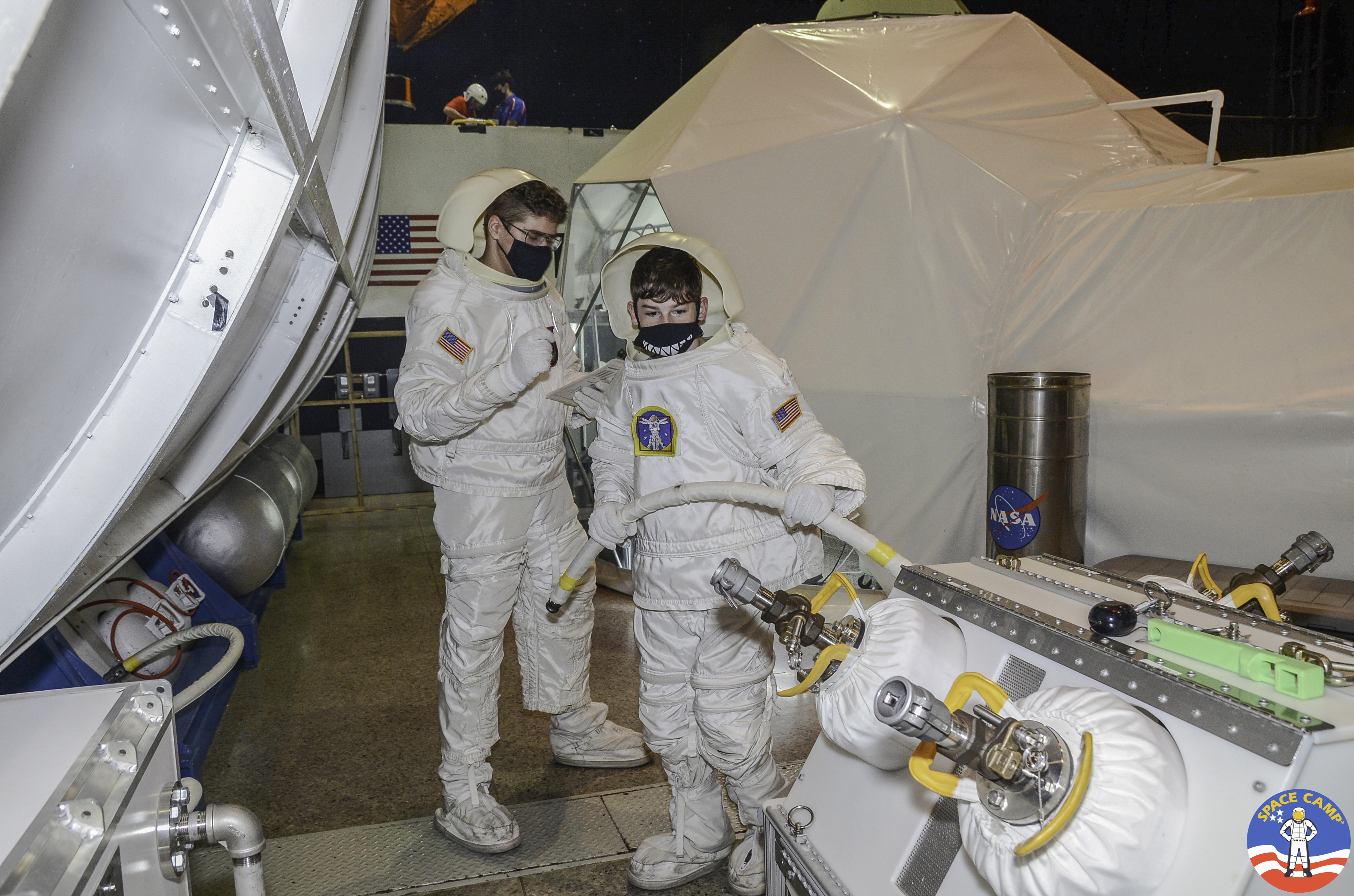 Brenden Cunningham wears a white spacesuit during the Space Academy program at Space Camp in  Huntsville, Ala. (Space Camp via Amy Cunningham via RPS)