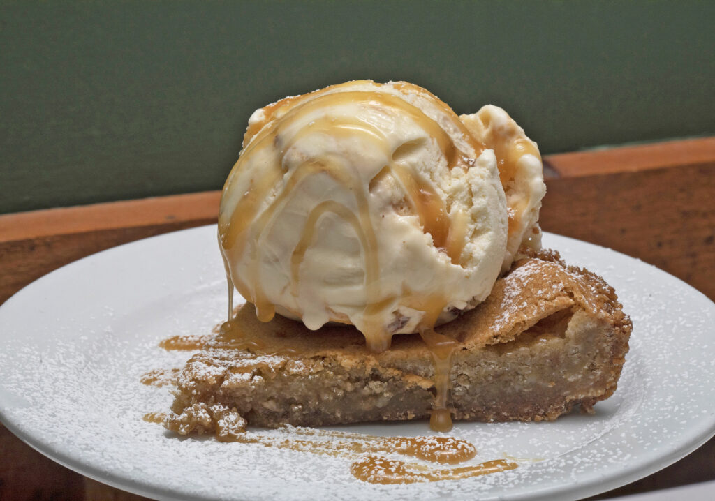 The Speakeasy might be the only restaurant in Nebraska with Milk Bar Pie, created by famous pastry chef Christina Tosi, on its dessert menu. The salty-sweet pie has an oatmeal cookie crust, and the restaurant tops it with ice cream.<br />(Laura Beahm / Flatwater Free Press)