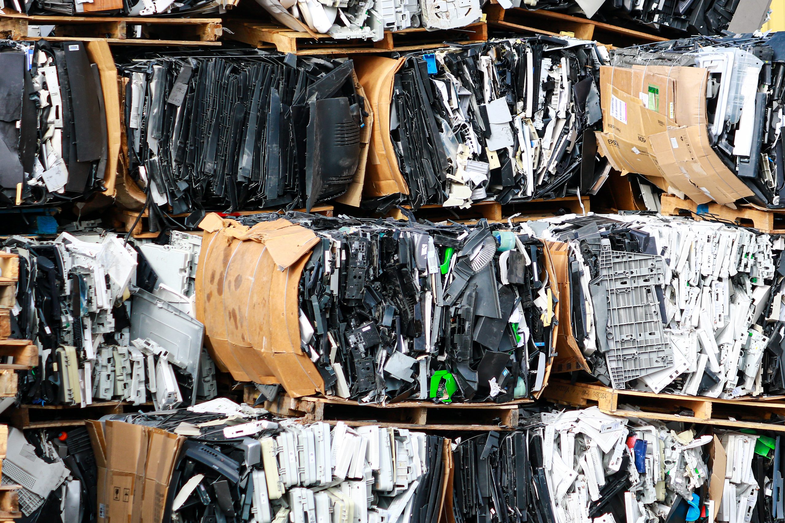 Behind the American Recycling warehouse, pallets of plastic pieces are stacked and prepared to be recycled. (Emma Krab/NNS)