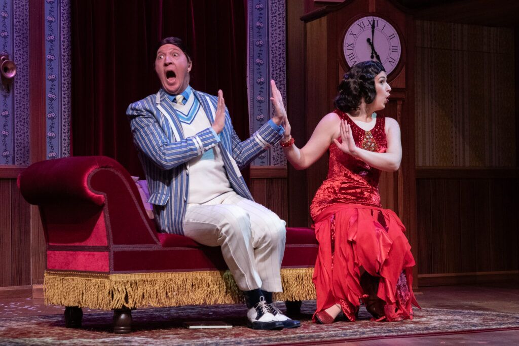 Steve Krambeck and Lauren Krupski in “The Play That Goes Wrong” at the Omaha Community Playhouse in early 2024.<br />(Courtesy of Omaha Community Playhouse)