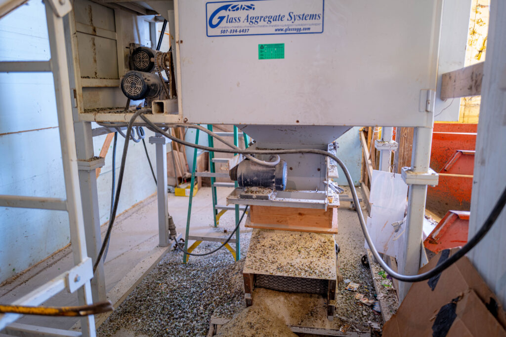 Having the ability to crush and reuse glass locally allowed Tekamah to hit a 1990s goal to cut the solid waste in landfills by half.<br />(Abiola Kosoko / Flatwater Free Press)