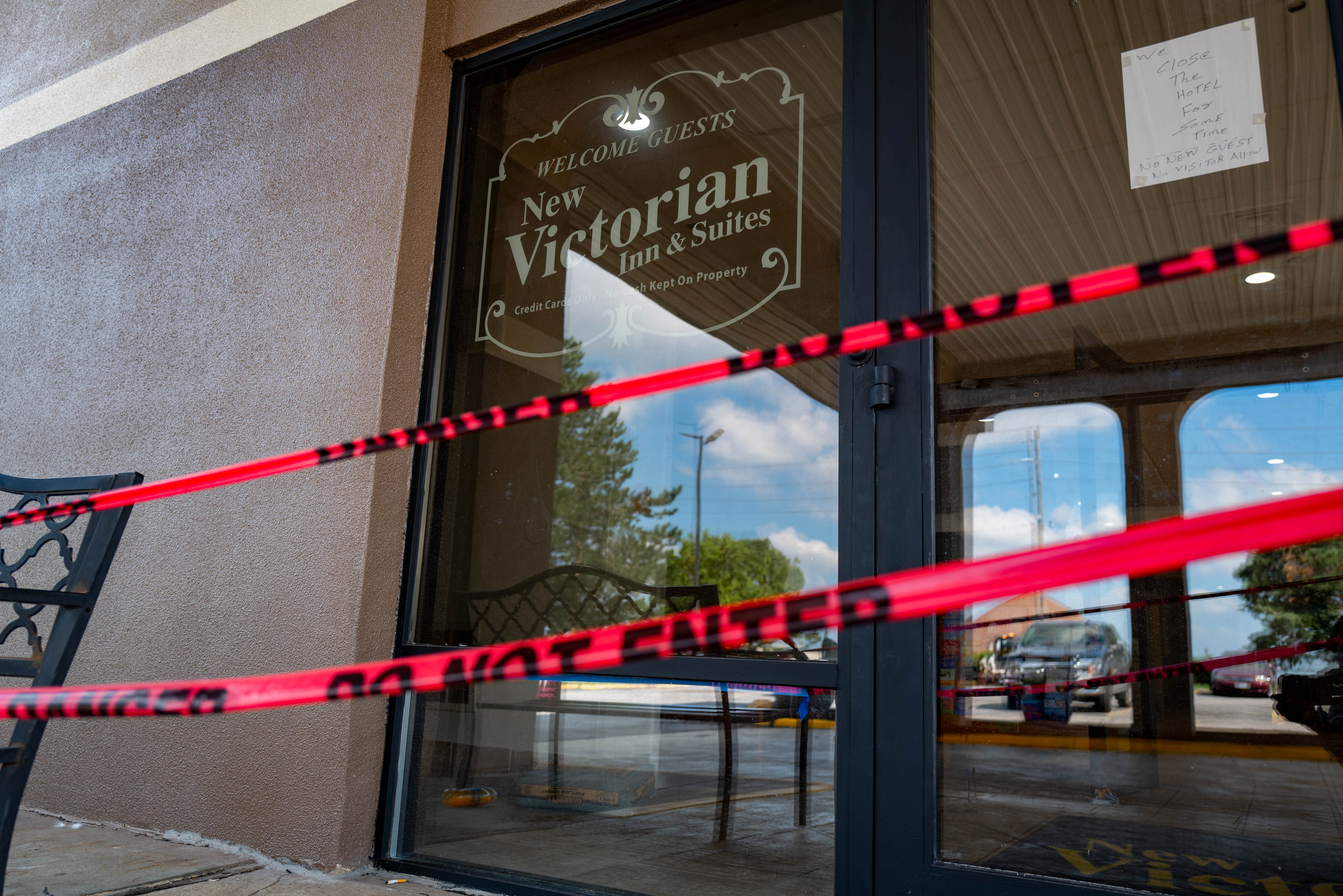 Law enforcement descended on the New Victorian Inn and Suites and three other Omaha-area hotels on Tuesday, Aug. 12, as part of a federal investigation into alleged human trafficking. Authorities also allege one suspect staged a crime in order to get his wife a visa reserved for victims of violent crime.<br />(Abiola Kosoko / Flatwater Free Press)