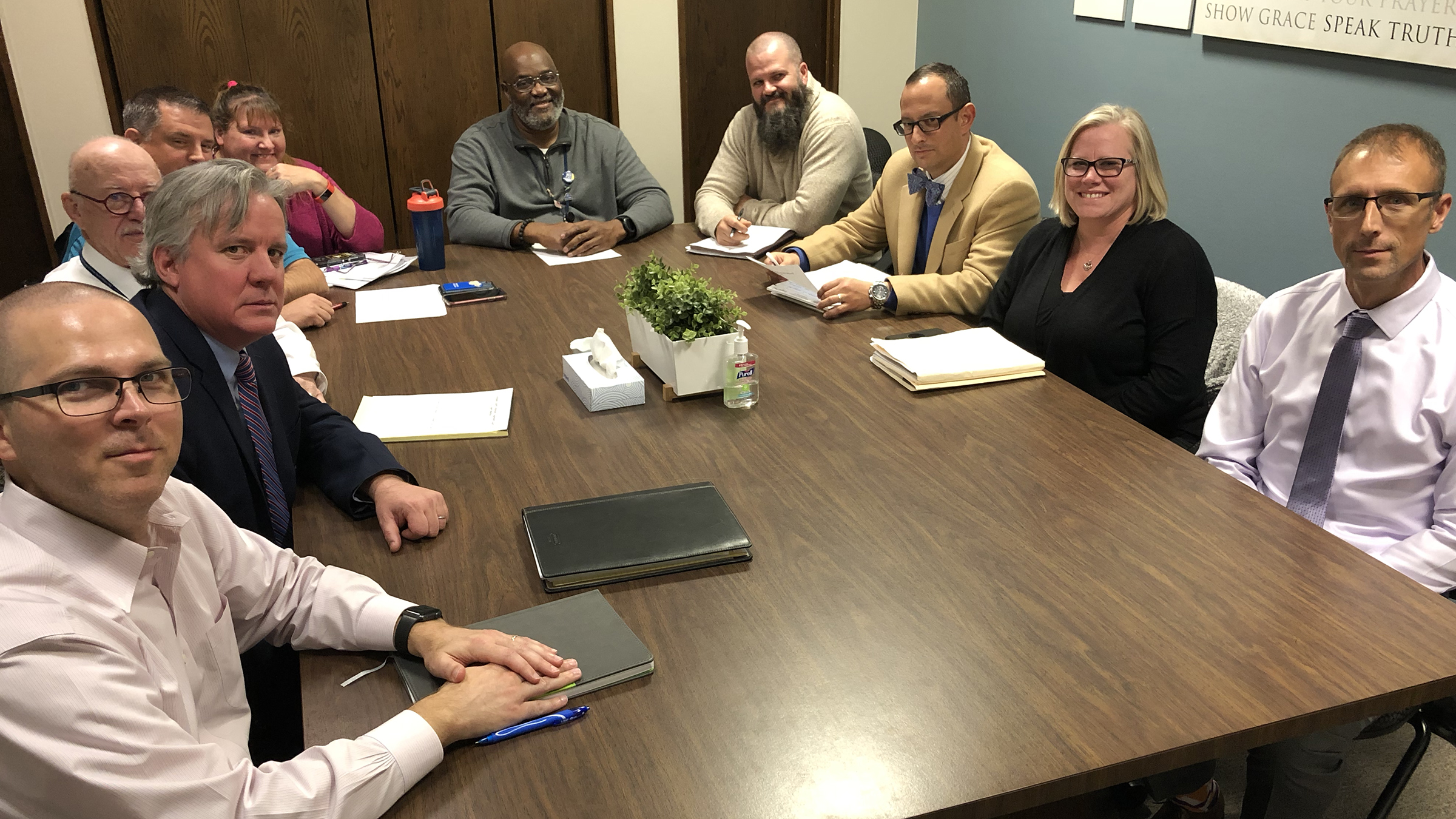 Members of the Douglas County Veterans Treatment Court team pose for a photo during a break from a weekly team meeting in the Douglas County Courthouse on Thursday, Nov. 7, 2019. (Photo by Scott Stewart)