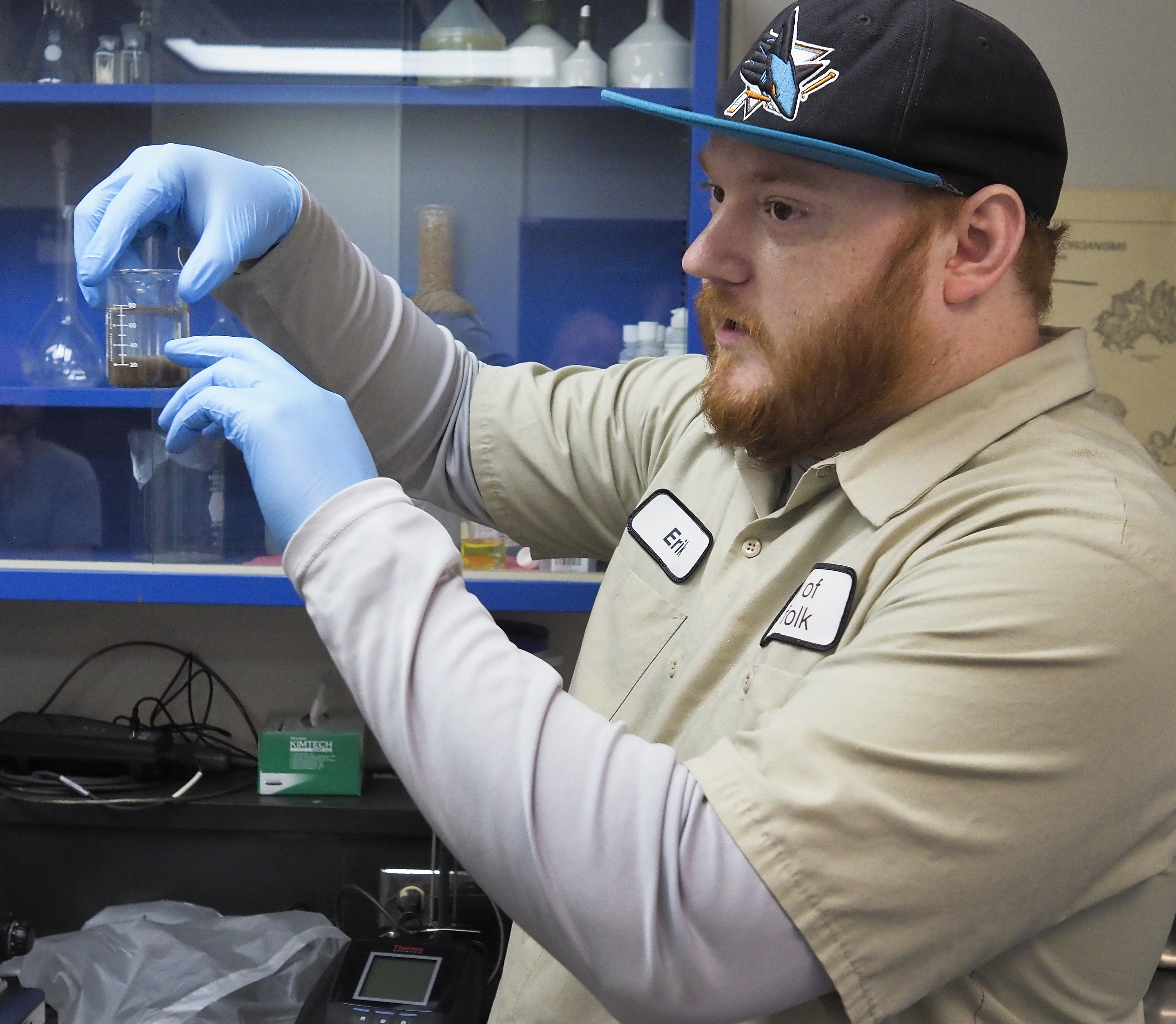 City of Norfolk lab technician Eric Johnston discusses testing controls in the Norfolk facility’s lab.<br />(Jerry L Mennenga / Flatwater Free Press)