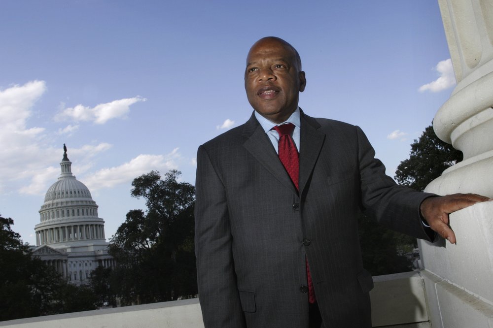 With the Capitol Dome in the background, U.S. Rep. John Lewis, D-Ga., poses on Capitol Hill in Washington, Oct. 10, 2007. Lewis, who carried the struggle against racial discrimination from Southern battlegrounds of the 1960s to the halls of Congress, died July 17, 2020. (AP)