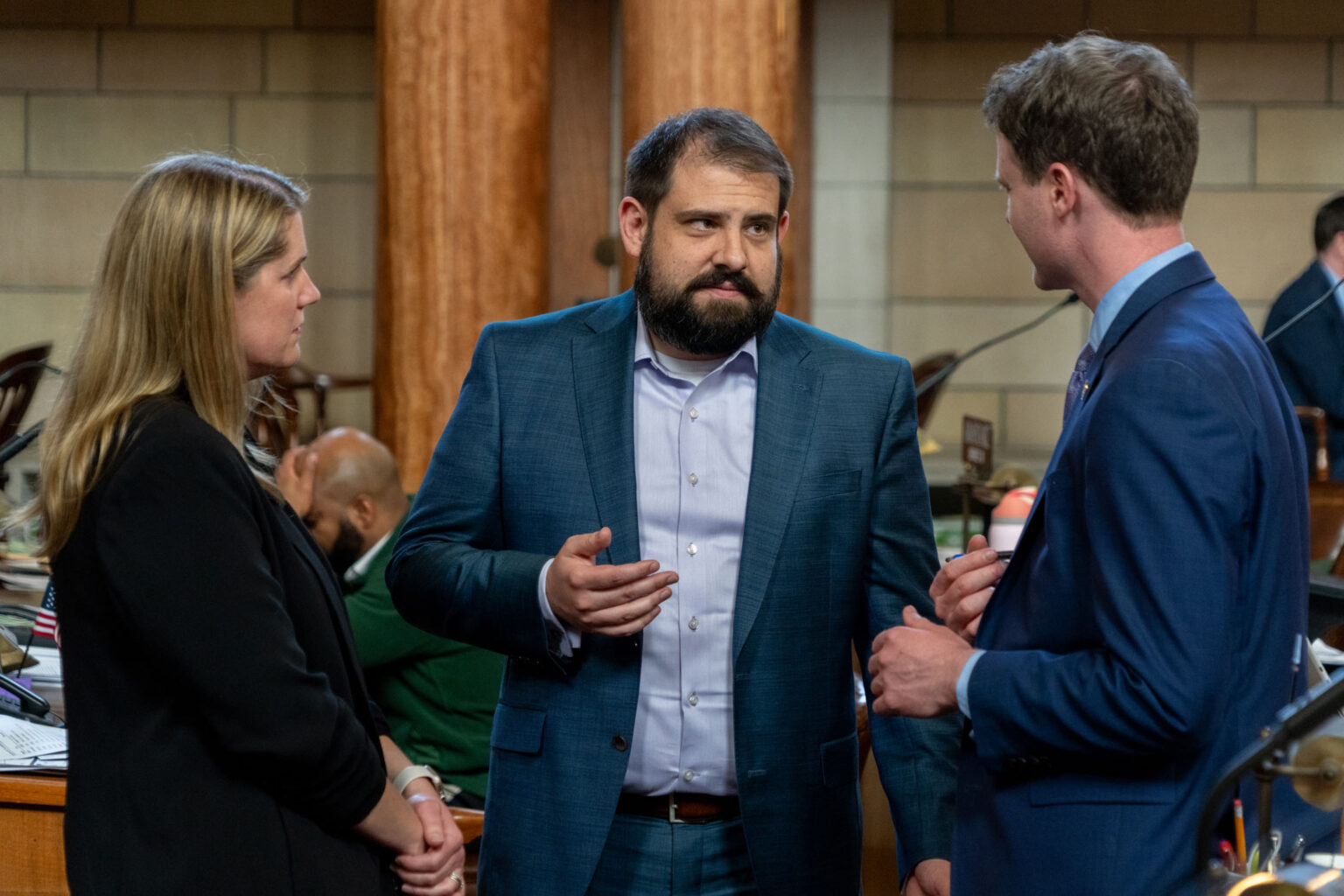 State Sen. Eliot Bostar of Lincoln (center) is flanked by State Sens. Carolyn Bosn and Beau Ballard both of Lincoln, April 10, 2024.<br />(Zach Wendling / Nebraska Examiner)