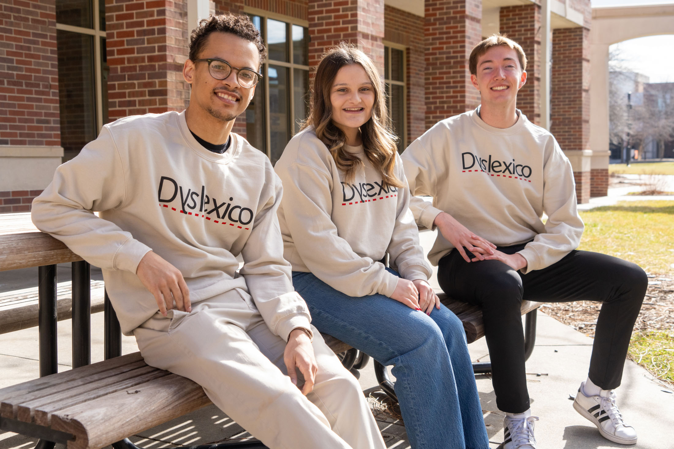 Members of the Dyslexico team at the University of Nebraska-Lincoln that is working to combat dyslexia with AI-based tools. From left: Tristan Curd, Bridget Peterkin and Nick Lauver on Friday, Feb. 9, 2024.<br />(Zach Wendling / Nebraska Examiner)