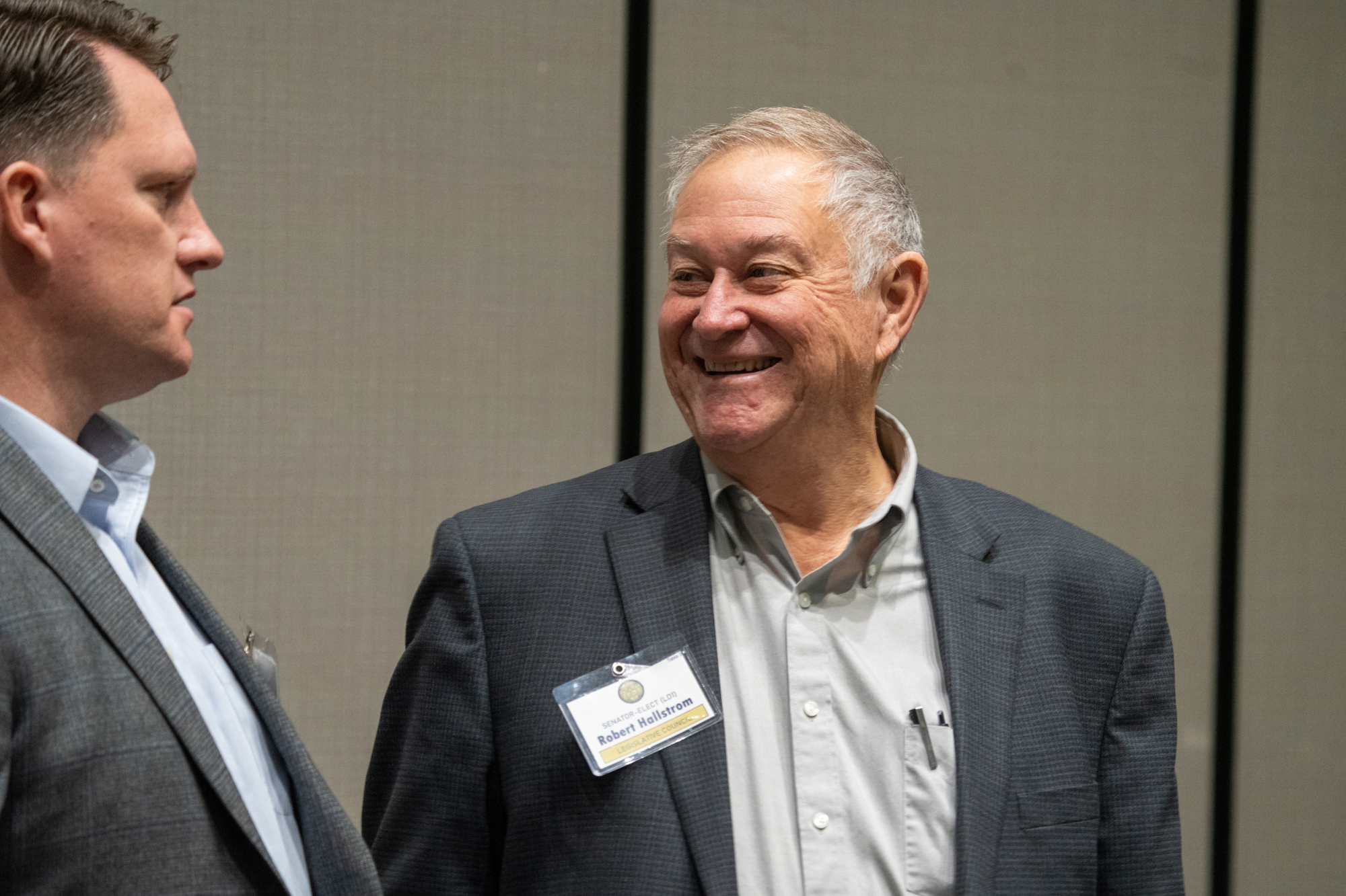 State Sen.-elect Robert Hallstrom of Syracuse talks with State Sen. Ben Hansen of Blair at a legislative retreat in Kearney on Friday, Dec. 13, 2024.<br />(Zach Wendling / Nebraska Examiner)