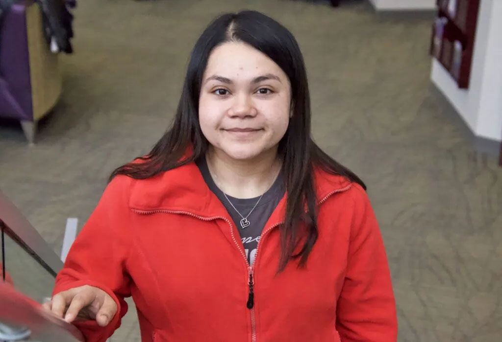 Kassandra Nolasco, a missing and anti-trafficking youth specialist at Project Harmony, has 21 children and young adults in her caseload. Most come from Spanish-speaking households.<br />(Jeremy Turley / Flatwater Free Press)