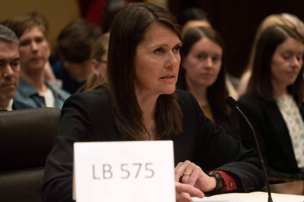 State Sen. Kathleen Kauth of Omaha introduces a bill Monday, Feb. 13, 2023, in Lincoln, Neb., before the Education Committee that would define school group bathrooms and sporting teams as either male or female. (Zach Wendling / Nebraska Examiner)