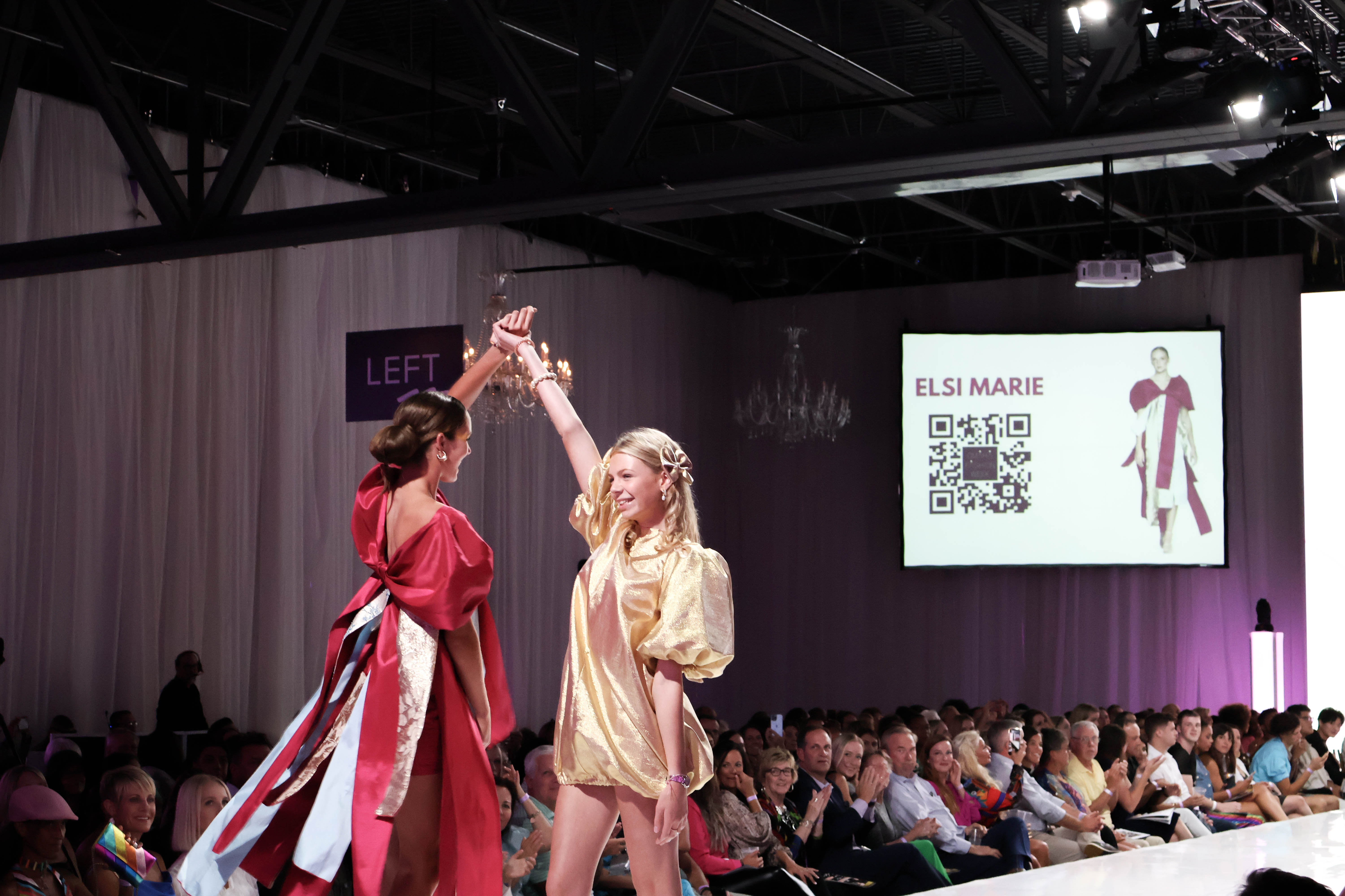 Designer Elsi Marie (right) celebrates a successful runway show. (Josie Charron / The Daily Record)