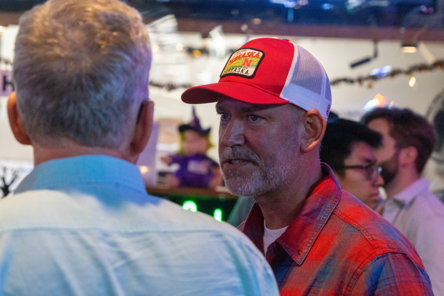 U.S. Senate candidate Dan Osborn meets with prospective voters at a Big Red Keno in west Lincoln on Oct. 20, 2024.<br />(Zach Wendling / Nebraska Examiner)