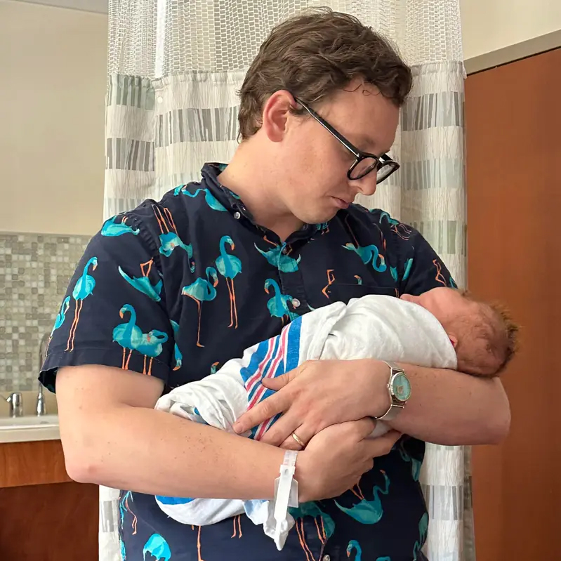 Nick holds Arlo the day he was born. A difficult delivery left a deep hollow above his forehead.<br />(Courtesy of Flannery Family)