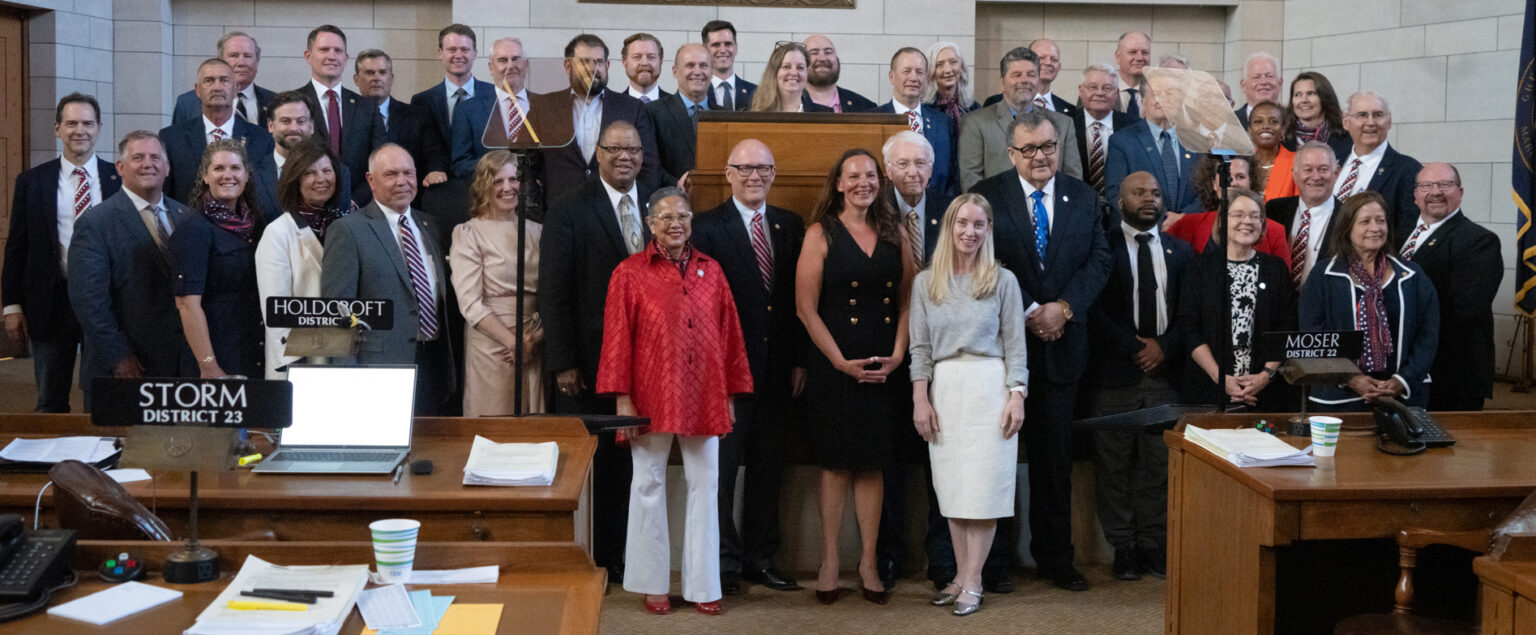 State senators join together after adjourning for the year at the end of the 2025 legislative session. Not pictured: State Sens. Christy Armendariz of Omaha, Myron Dorn of Adams, Rob Dover of Norfolk and Glen Meyer of Pender, June 2, 2025.<br />(Zach Wendling / Nebraska Examiner)