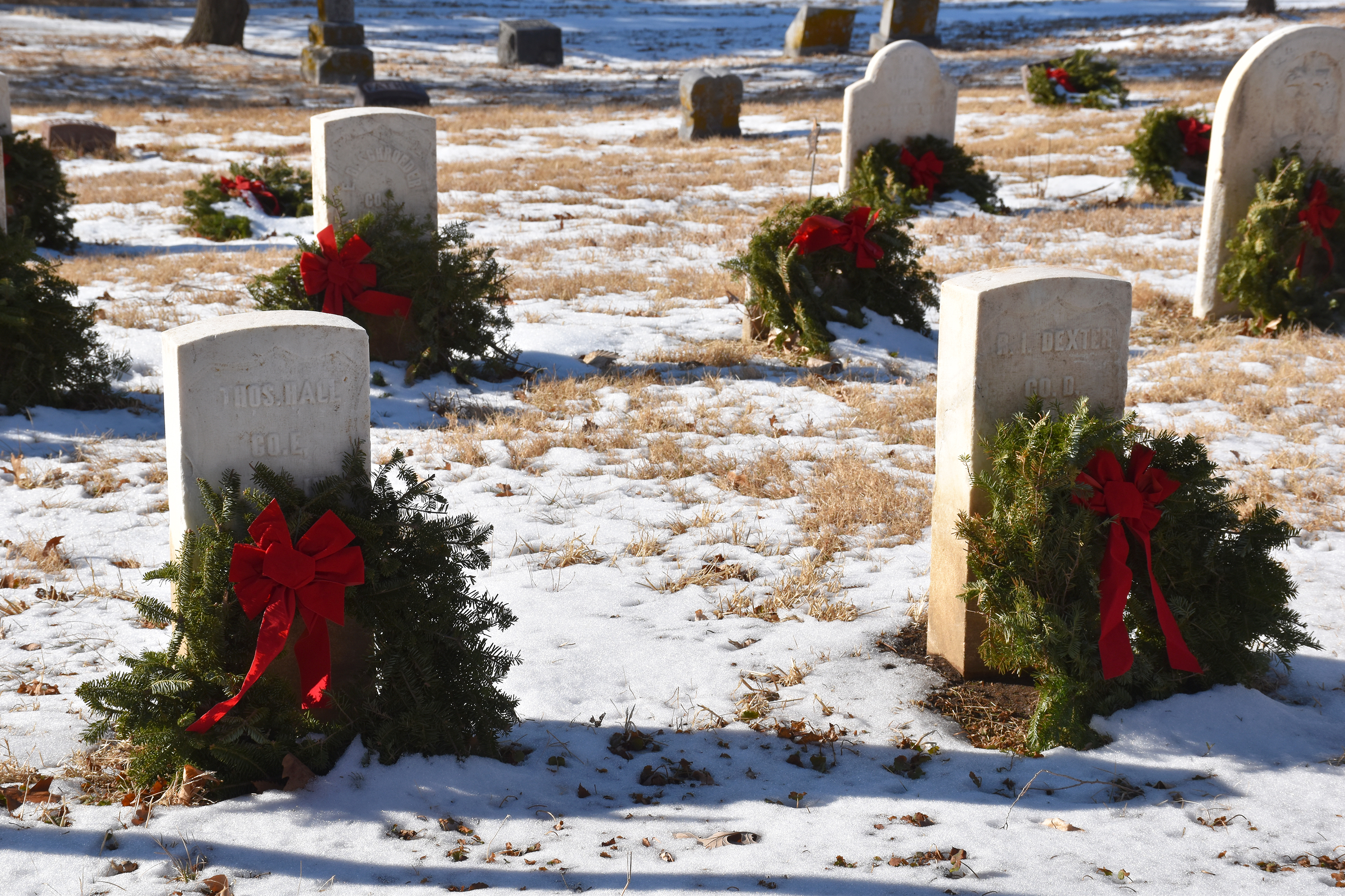 Omaha’s Historic Prospect Hill Cemetery participated in Wreaths Across America, placing live, handmade balsam wreaths on veterans’ graves. The veteran’s name is said aloud as the wreath is placed, honoring their service and keeping their memory alive. Veterans from every American conflict, beginning with the War of 1812, are buried here. (Carla Chance / The Daily Record)