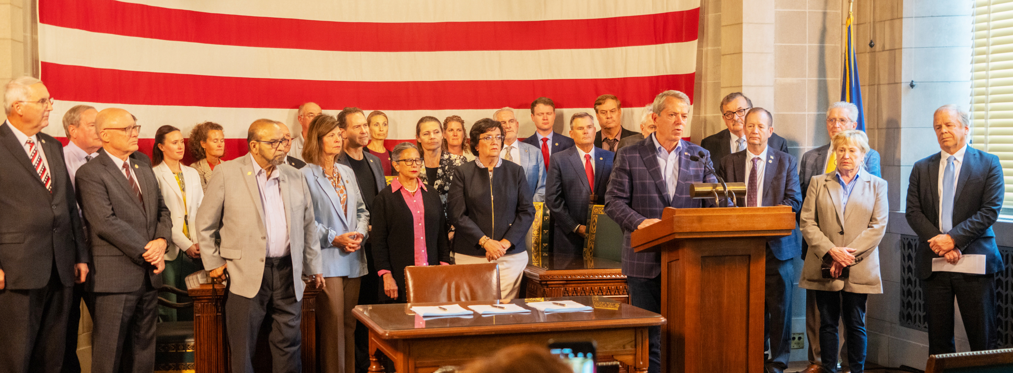 Gov. Jim Pillen is joined by two dozen lawmakers for a news conference at the end of the Legislature’s special session to address property taxes that begin almost one month prior, Aug. 20, 2024.<br />(Zach Wendling / Nebraska Examiner)
