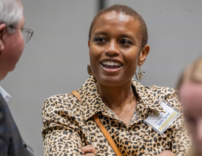 State Sen.-elect Ashlei Spivey of Omaha talks with State Sen. Rick Holdcroft of Bellevue at a legislative retreat in Kearney on Thursday, Dec. 12, 2024.<br />(Zach Wendling / Nebraska Examiner)