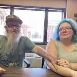 Bruce and Nova Jewett, who are experiencing homelessness, sit at the Hilltop Inn in Berlin, Vt., on Wednesday, Sept. 18, 2024, where they have been living and will have to leave by Oct. 1, 2024. 
(Lisa Rathke / AP Photo)