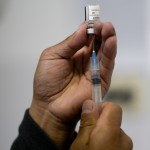 A healthcare worker prepares a shot of the Pfizer COVID-19 vaccine in La Paz, Bolivia, Jan. 7, 2025.
(Juan Karita / AP Photo)