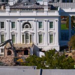 Construction workers (bottom right) atop the U.S. Treasury, watch as work continues on a largely demolished part of the East Wing of the White House, Thursday, Oct. 23, 2025, in Washington, before construction of a new ballroom. 
(Jacquelyn Martin / AP Photo)