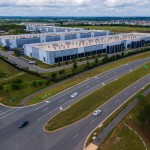 Cars drive past data centers that house computer servers and hardware required to support modern internet use, such as artificial intelligence, in Ashburn, Virginia, July 16, 2023. 
(Ted Shaffrey / AP Photo)