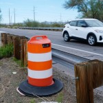 A license plate reader used by U.S. Border Patrol is hidden in a traffic cone while capturing passing vehicles on AZ Highway 85, Tuesday, Oct. 21, 2025, in Gila Bend, Ariz.
(Ross D. Franklin / AP Photo)