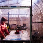 Tomoko Kobayashi looks at a color-coded map of radiation levels created by local residents during an interview near a radiation monitoring lab in Odaka, Friday, Feb. 13, 2026. 
(Louise Delmotte / AP Photo)
