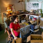 Nicole Huguenin, executive director of Maui Rapid Response, a nonprofit supporting Maui fire survivors with cash assistance, organizes canned food at the organization's warehouse in Kahului, Hawaii, Wednesday, March 4, 2026.
(Mengshin Lin / AP Photo)