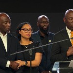 In this photo taken with a smartphone, Ben Crump (right) an attorney for the family of Nolan Wells, speaks at a news conference in Stonecrest, Ga., Thursday, Sept. 22, 2026, accompanied by Wells' parents, Elmore and Christine Wonsley.
(Emilie Megnien / AP Photo)