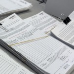 Petition pages reviewed by local county election officials and returned to the Nebraska Secretary of State’s Office sit in the office for public inspection at the office’s Elections Division in downtown Lincoln on Aug. 24, 2026.
(Zach Wendling / Nebraska Examiner)