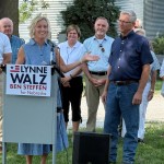 Former State Sen. Lynne Walz of Fremont, the Democratic nominee for Nebraska governor (at podium) announces her pick of Humboldt farmer Ben Steffen as her choice for lieutenant governor on Tuesday, July 28, 2026, on a farm north of Elkhorn.
(Zach Wendling / Nebraska Examiner)