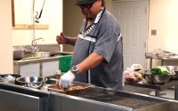 Anthony Warrior discusses the nutritional benefits of cooking corn husks. 
(Tim Trudell / Flatwater Free Press)
