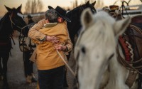 Jake Harvath hugs his mother, Leah, as he arrives at Sage Creek Equestrian in Charleston, Utah on Thursday, Dec. 5, 2024, completing a 6,000-mile, 14-month ride around the U.S. 
(Spenser Heaps / Utah News Dispatch)