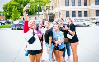 Kalli Kroeker, then an intern for the Hickman Area Community Foundation Fund, takes a group selfie during a May 2023 peer learning session for Hometown Interns in Ord. The Nebraska Community Foundation’s internship program has placed 95 interns back in the rural Nebraska home counties, where they work on community service projects to better the place where they grew up. 
(Courtesy photo)