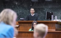 Lancaster County Juvenile Court Judge Reggie Ryder presides in a simulated courtroom for the College of Law Children’s Justice Clinic in this 2021 photo. (Craig Chandler / University Communication and Marketing)