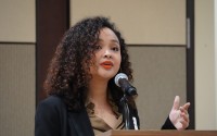Louise Mabulo gives a speech to a crowd at the Nebraska East Union about her work on the Cacao Project in the Philippines. 
(Marissa Lindemann / NNS)