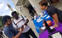 Michella Blankman, team member of Ideologix Insights, provides information about the polling-focused startup to University of Nebraska at Omaha students on National Voter Registration Day. 
(Courtesy of Ideologix Insights)