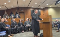 Judge Michael W. Jensen discusses his path to his judicial appointment before other judges from the Fourth District and Douglas County.
(Tim Trudell / The Daily Record)