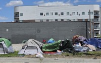 A homeless encampment north of 17th and Cuming Street in Omaha, Nebraska. 
(Tim Trudell / The Daily Record)