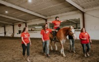 The HETRA team is committed to improve the quality of life both physically and emotionally for adults and children of all ability levels through equine-assisted activities. (Courtesy of HETRA)