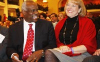 Supreme Court Justice Clarence Thomas (left) sits with his wife Virginia Lamp Thomas, as he is introduced at the Federalist Society in Washington, Thursday, Nov. 15, 2007.
(Charles Dharapak / AP Photo)