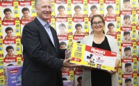 Joanne Samuel Goldblum, CEO of the National Diaper Bank Network, accepts a donation of 1.5 million diapers from Babies"R"Us and Huggies No Baby Unhugged, represented by Aric Melzl, General Manager of Huggies Healthcare at Kimberly-Clark at GOOD+ Foundation on Tuesday, Sept. 26, 2017, in New York. A portion of the donation (500,000 diapers) went to GOOD+ Foundation, an NDBN member. 
(Amy Sussman / AP Images for Huggies)