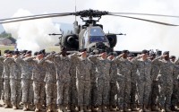 In this Friday, May 13, 2011 photo, Soldiers of 1AD attend a color casing ceremony of the First Armored Division at the US Army Airfield in Wiesbaden, Germany. Germany's Defense Ministry says U.S. Secretary of Defense Lloyd Austin told Defense Minister Annegret Kramp-Karrenbauer in his first conversation with her since taking up his new post that Germany is “highly valued” as a station for American soldiers. 
(Michael Probst / AP Photo)