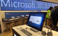 Microsoft computer is among items displayed at a Microsoft store in suburban Boston. 
 (Steven Senne / AP Photo)